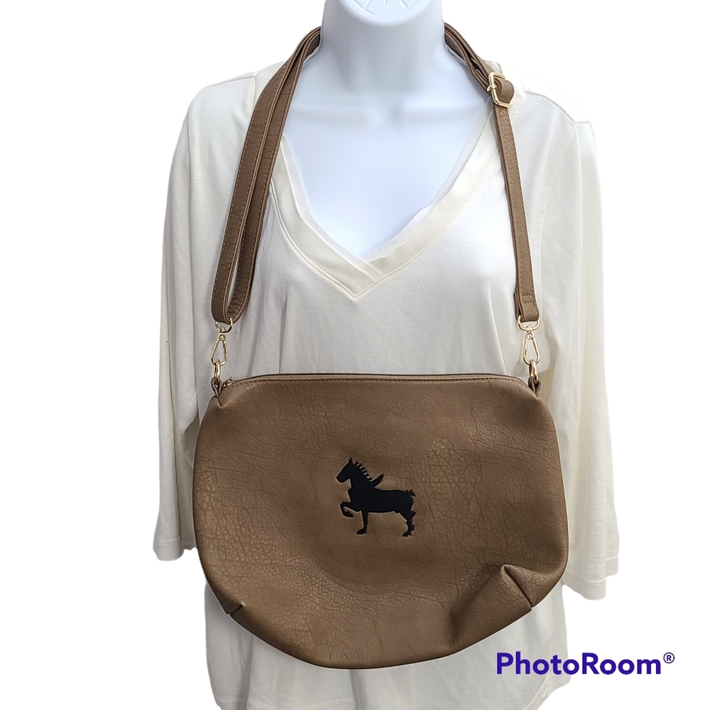 N Gil tan purse with a black horse silhouette